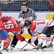 MINSK, BELARUS - MAY 20: Norway's Kristian Forsberg #26 faces off against Canada's Brayden Schenn #10 during preliminary round action at the 2014 IIHF Ice Hockey World Championship. (Photo by Richard Wolowicz/HHOF-IIHF Images)